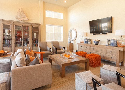 a living room with furniture and a television